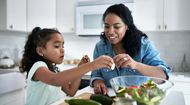 Let your child help prepare a meal.