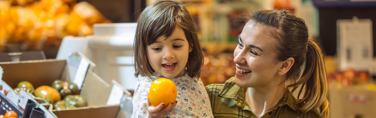 Teach your child to look for healthy foods at the grocery store. 