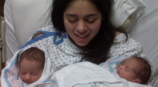 Venessa in the hospital with her newborn twins